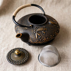 Théière en fonte japonaise 700 ml, motif poisson doré